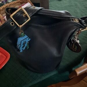 Coach Black Leather Helen’s Legacy husband smokes